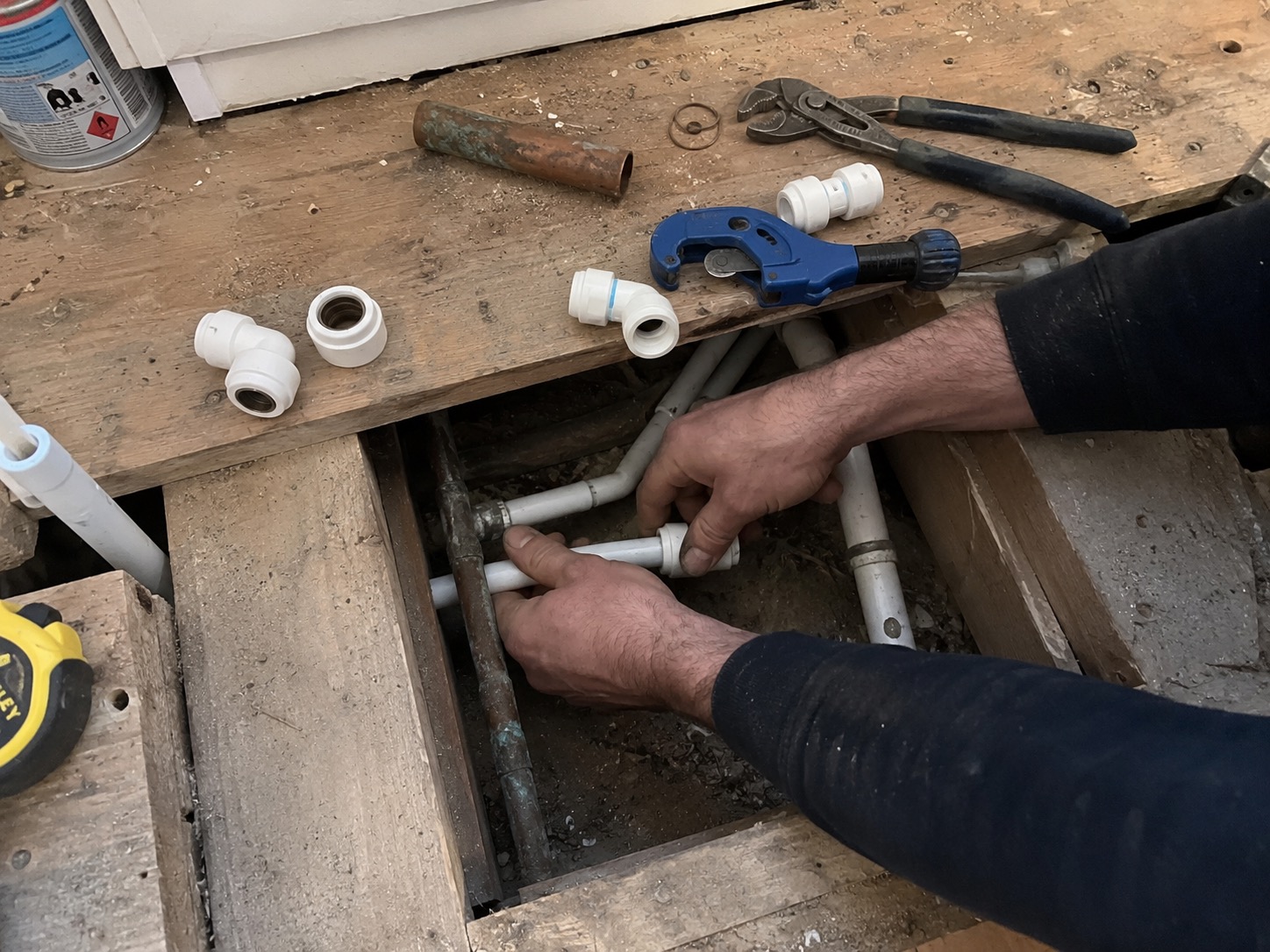 Replacing copper pipework with push-fit plastic under floorboards